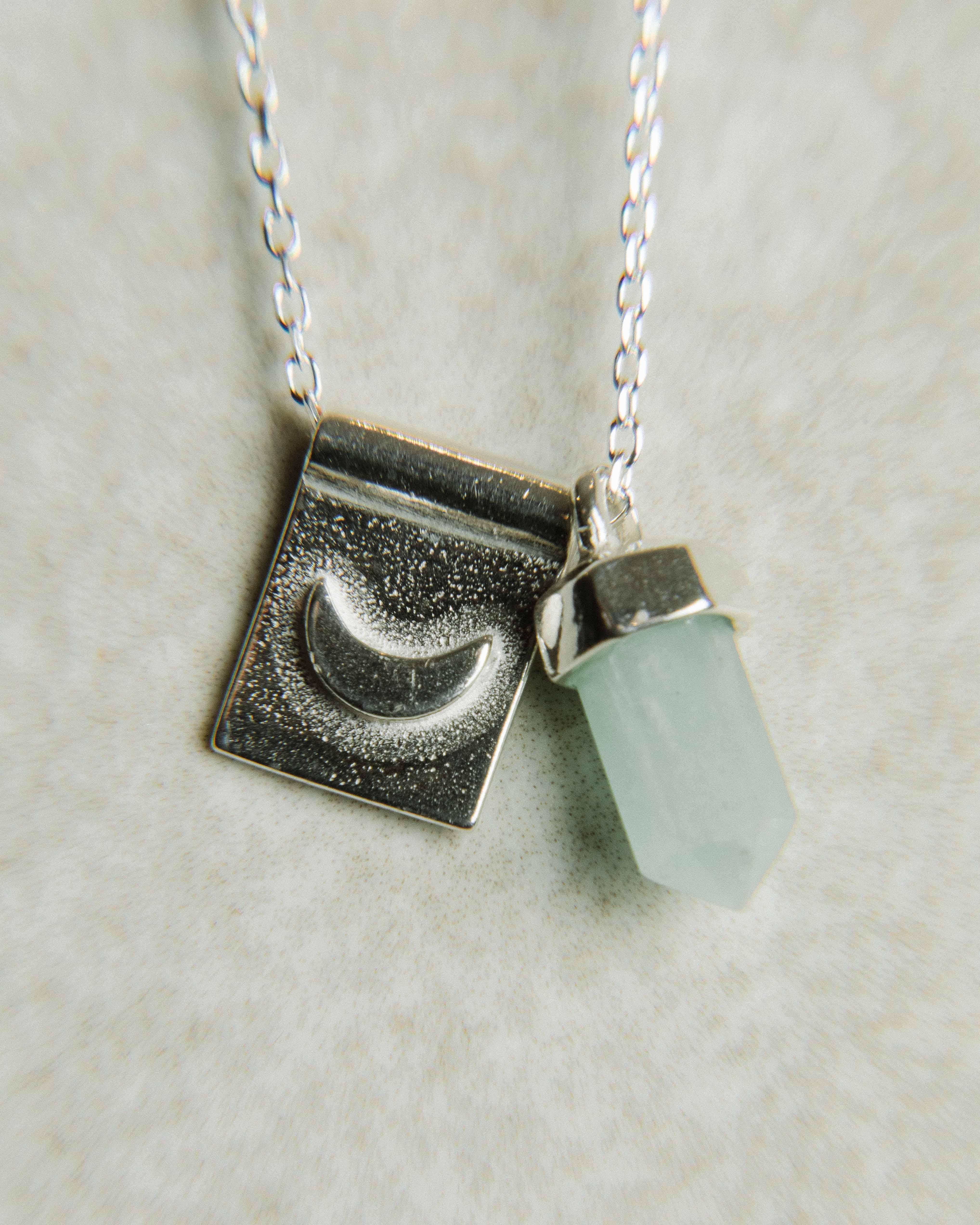 Luna nueva en Plata Reciclada